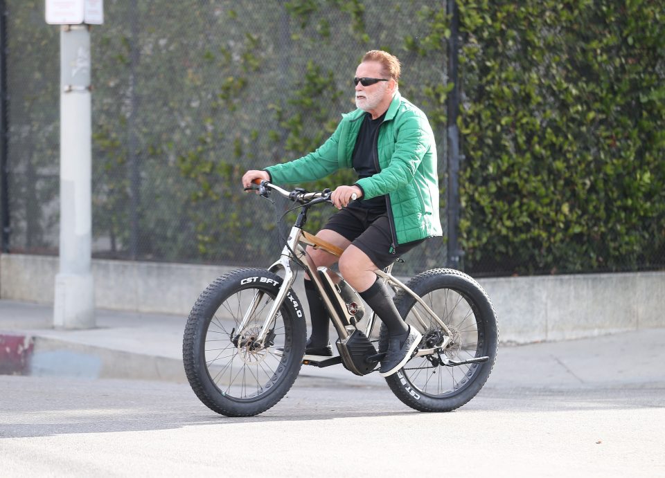 Arnold Schwarzenegger is seen riding a bike on Monday, Nov. 13, 2023, in Los Angeles.