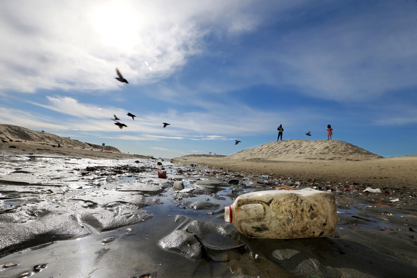 Plastic debris litters Junipero Beach in Long Beach, California.