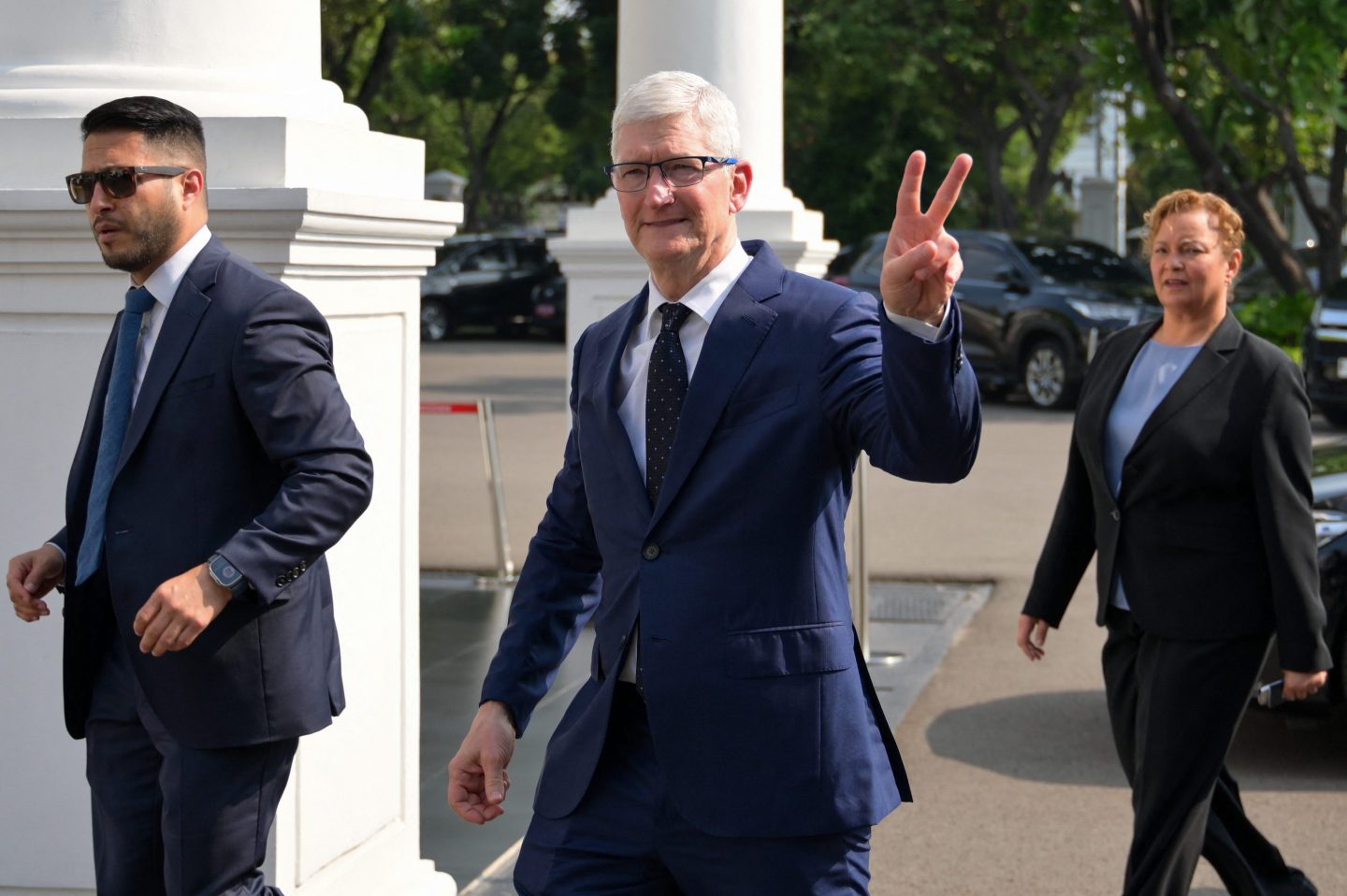 Apple CEO Tim Cook gestures as he arrives for a meeting with Indonesia's President Joko Widodo at the Merdeka Palace in Jakarta on April 17, 2024.