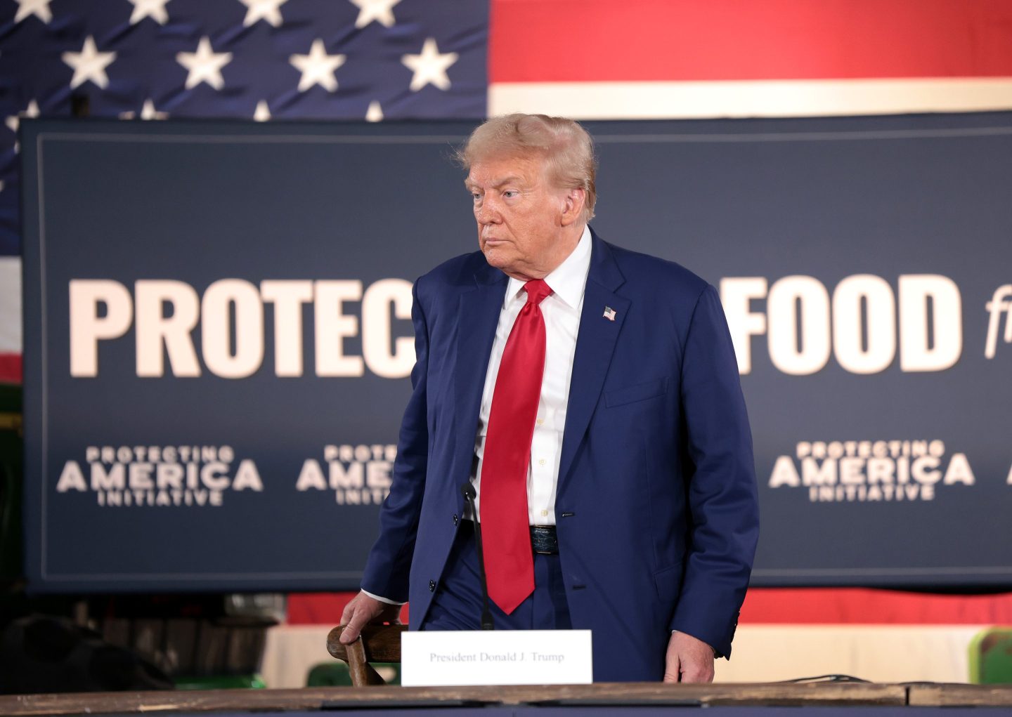 Then-Republican presidential nominee, former U.S. President Donald Trump, looks on during a campaign stop to address Pennsylvanians who are concerned about the threat of Communist China to U.S. agriculture at the Smith Family Farm on Sept. 23, 2024 in Smithton, Pa.