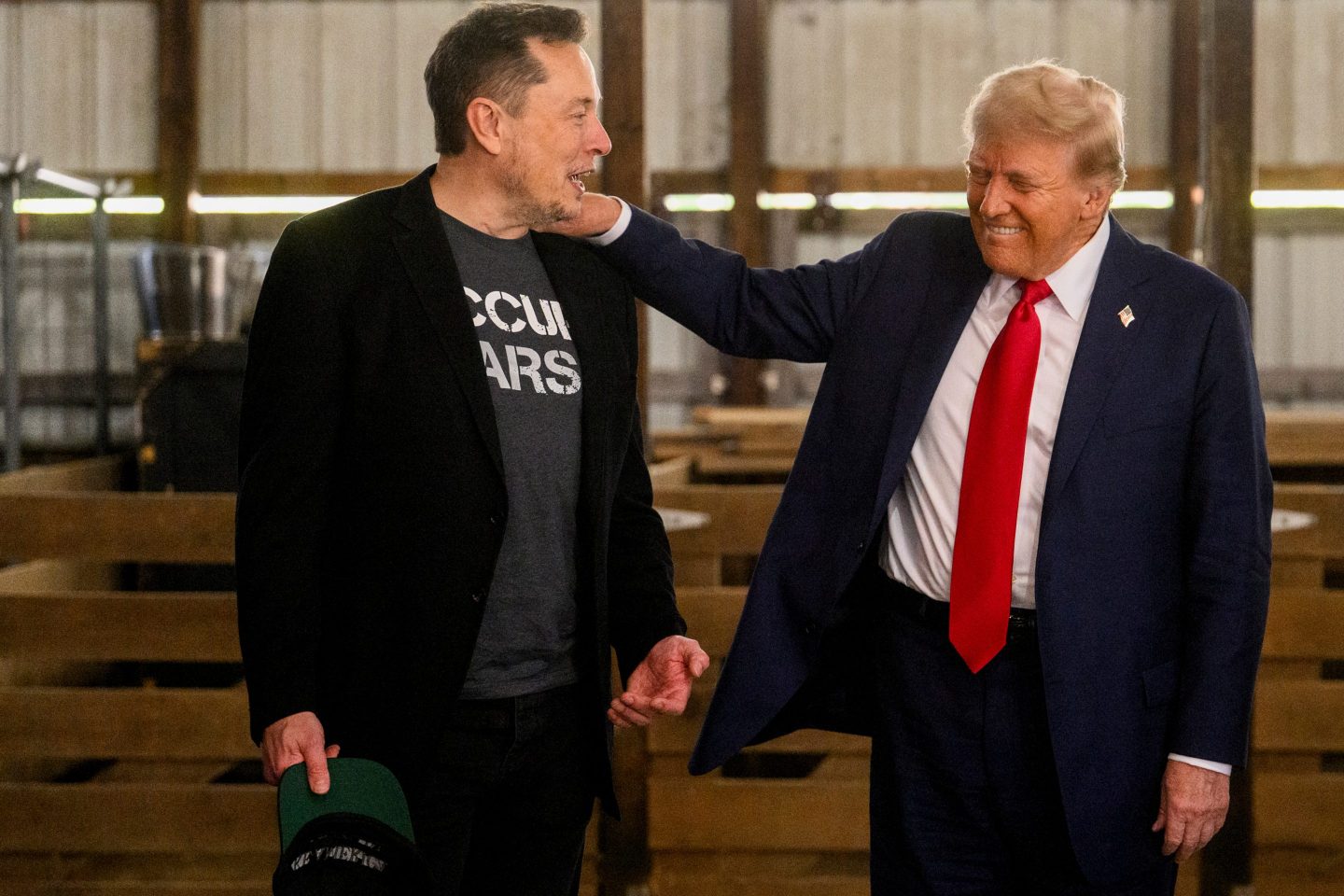 Tesla CEO Elon Musk (left) poses with president-elect Donald Trump.