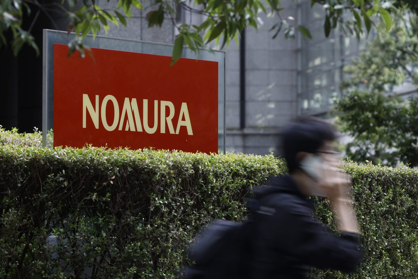 Signage for Nomura Holdings Inc. outside the company's Otemachi head office in Tokyo, Japan, on Wednesday, Oct. 30, 2024. Nomura Holdings is scheduled to announce it's second-quarter earnings figures on Nov. 1. Photographer: Kiyoshi Ota/Bloomberg via Getty Images