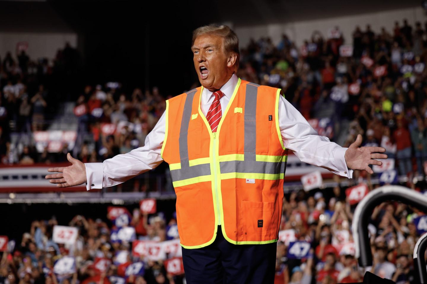Donald Trump in orange vest