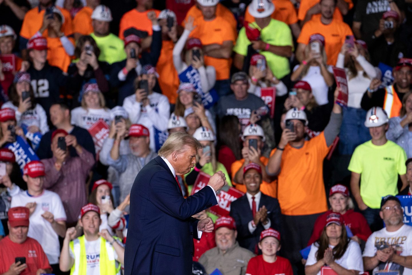 Donald Trump departs following his closing campaign event at Van Andel Arena in Grand Rapids, Michigan, early Tuesday.