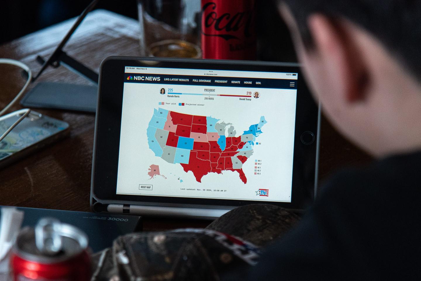 A man seen watching the broadcasting of the U.S. election results at the restaurant in Bangkok.