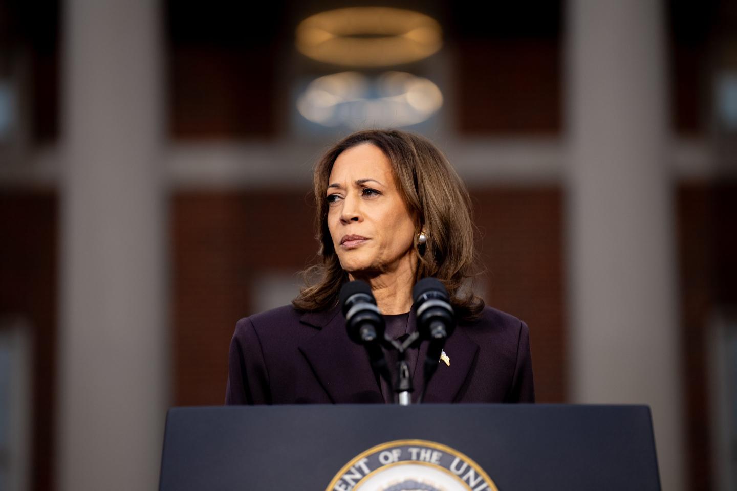 U.S. Vice President Kamala Harris standing behind a podium