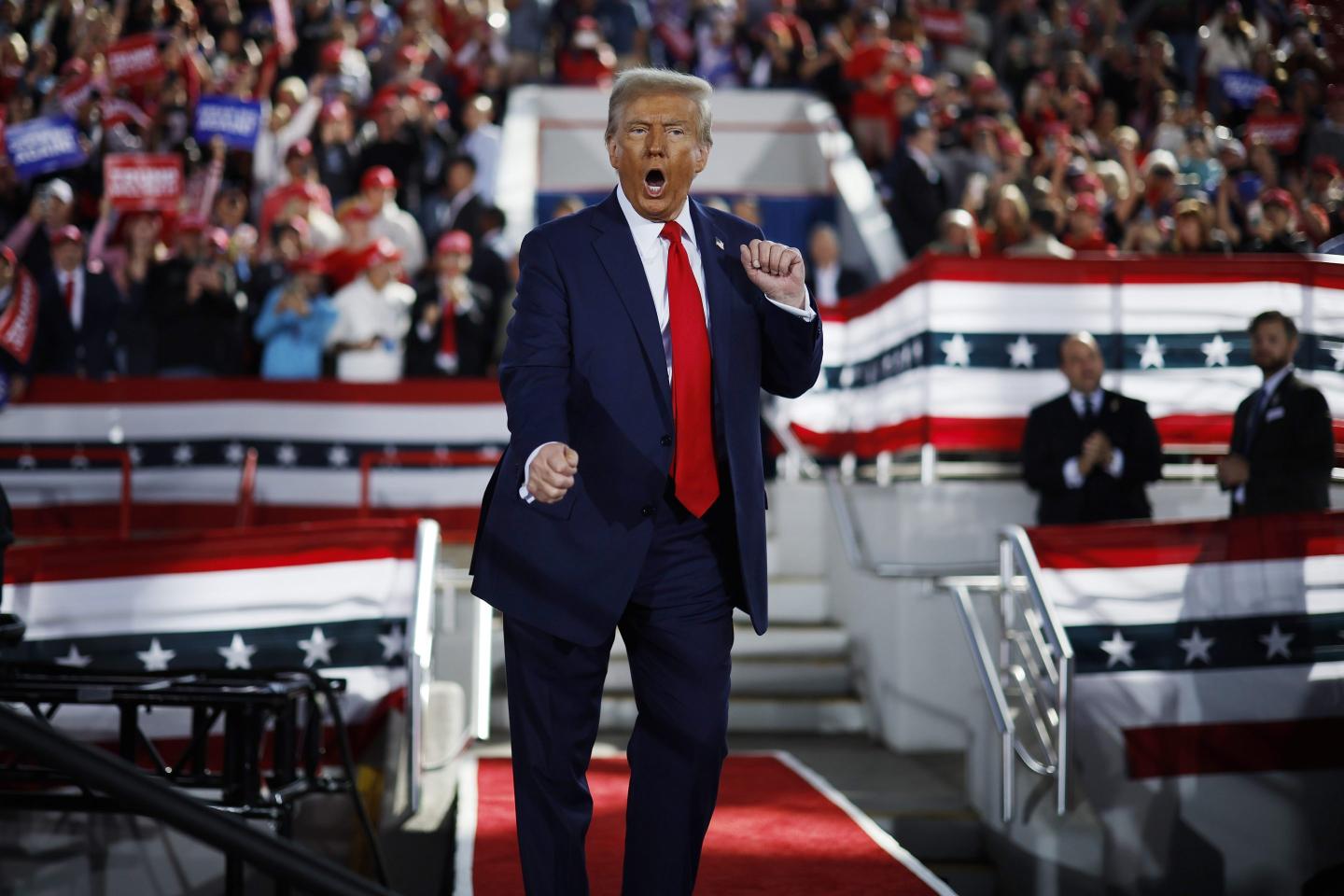 Donald Trump dances off stage at the conclusion of a campaign rally.