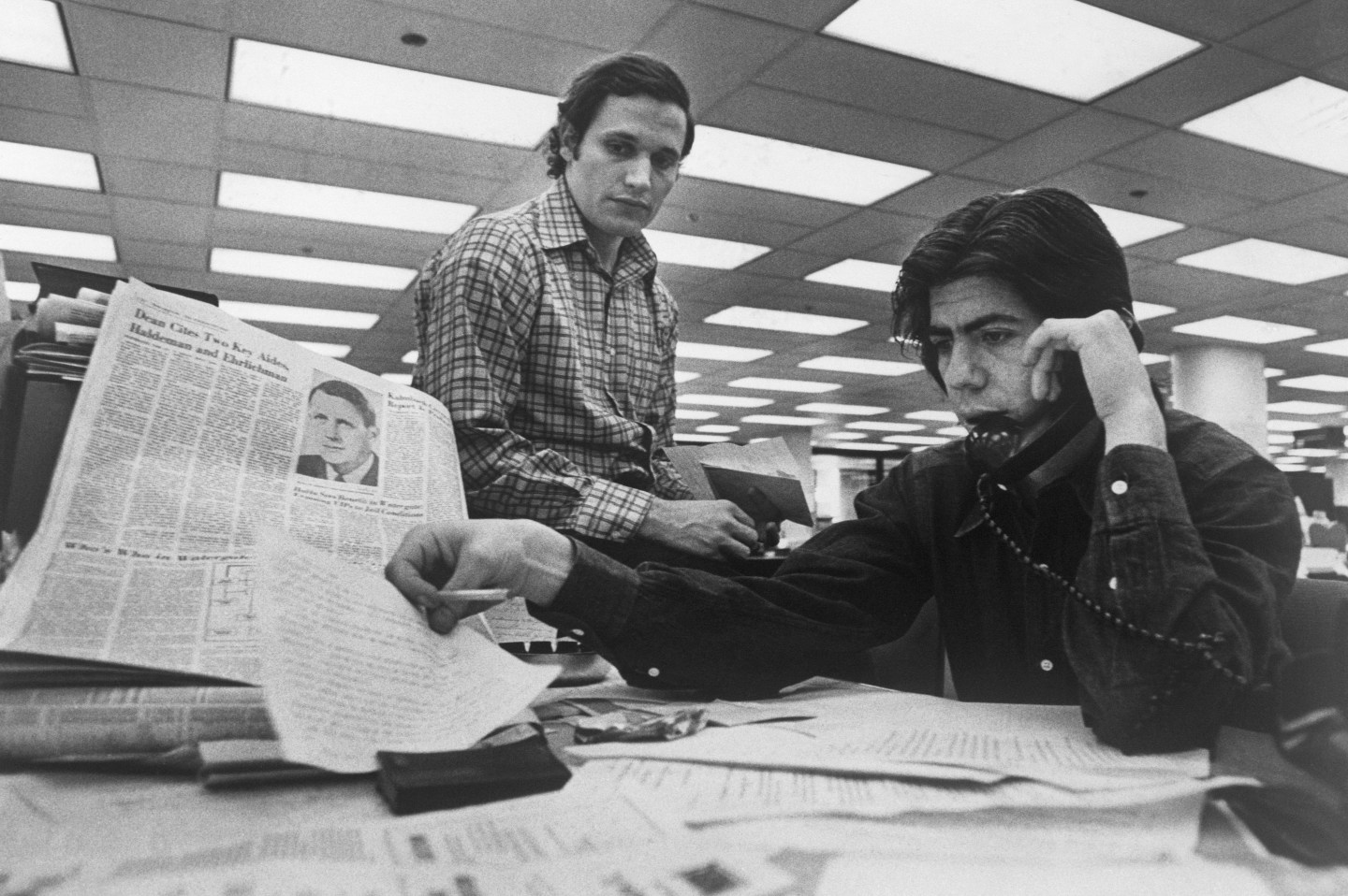 Washington Post writers Bob Woodward and Carl Bernstein at their desks in 1973.