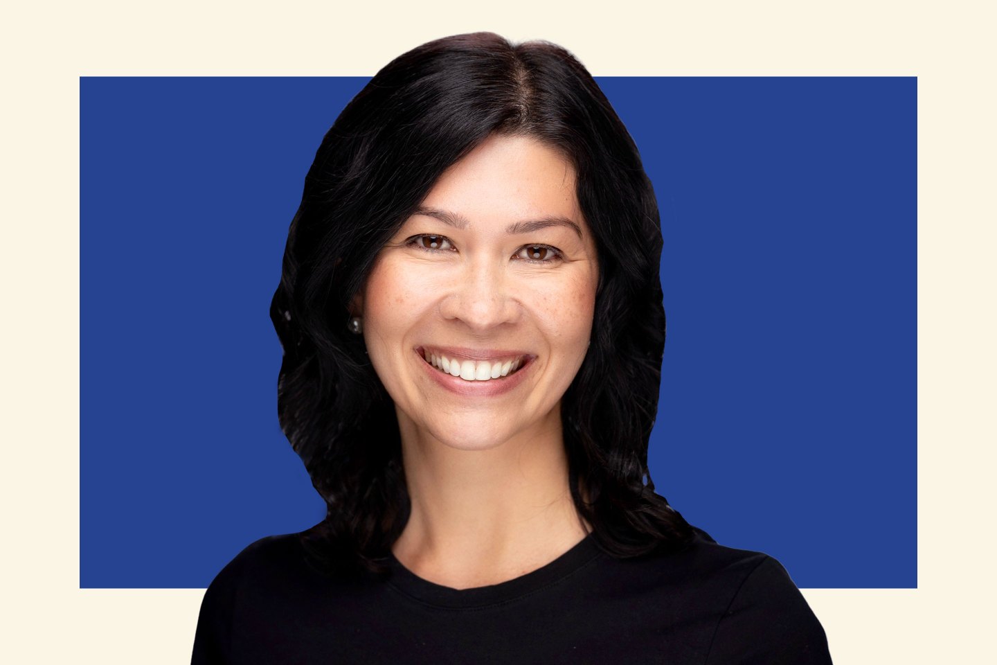 business woman smiles for a professional portrait