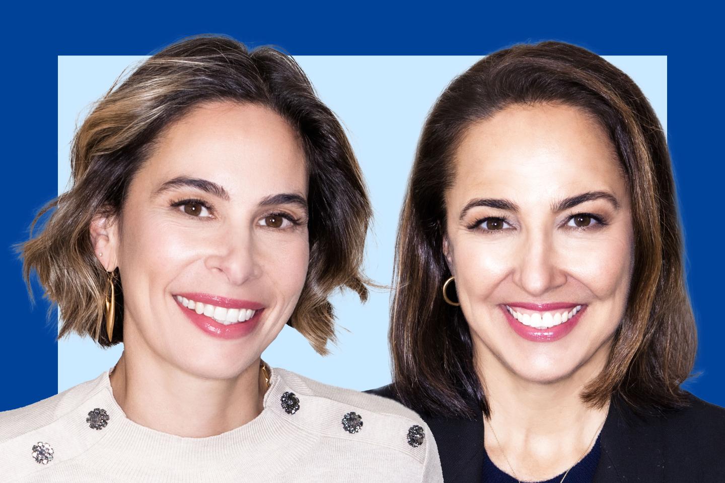 two businesswomen smiling