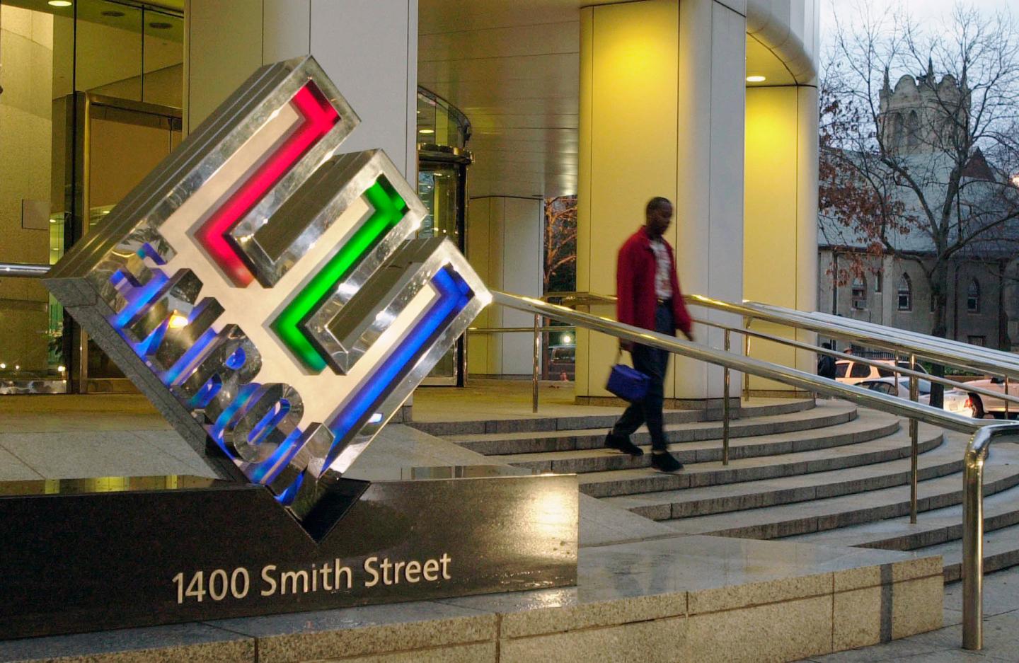 An unidentified person leaves Enron Corp.