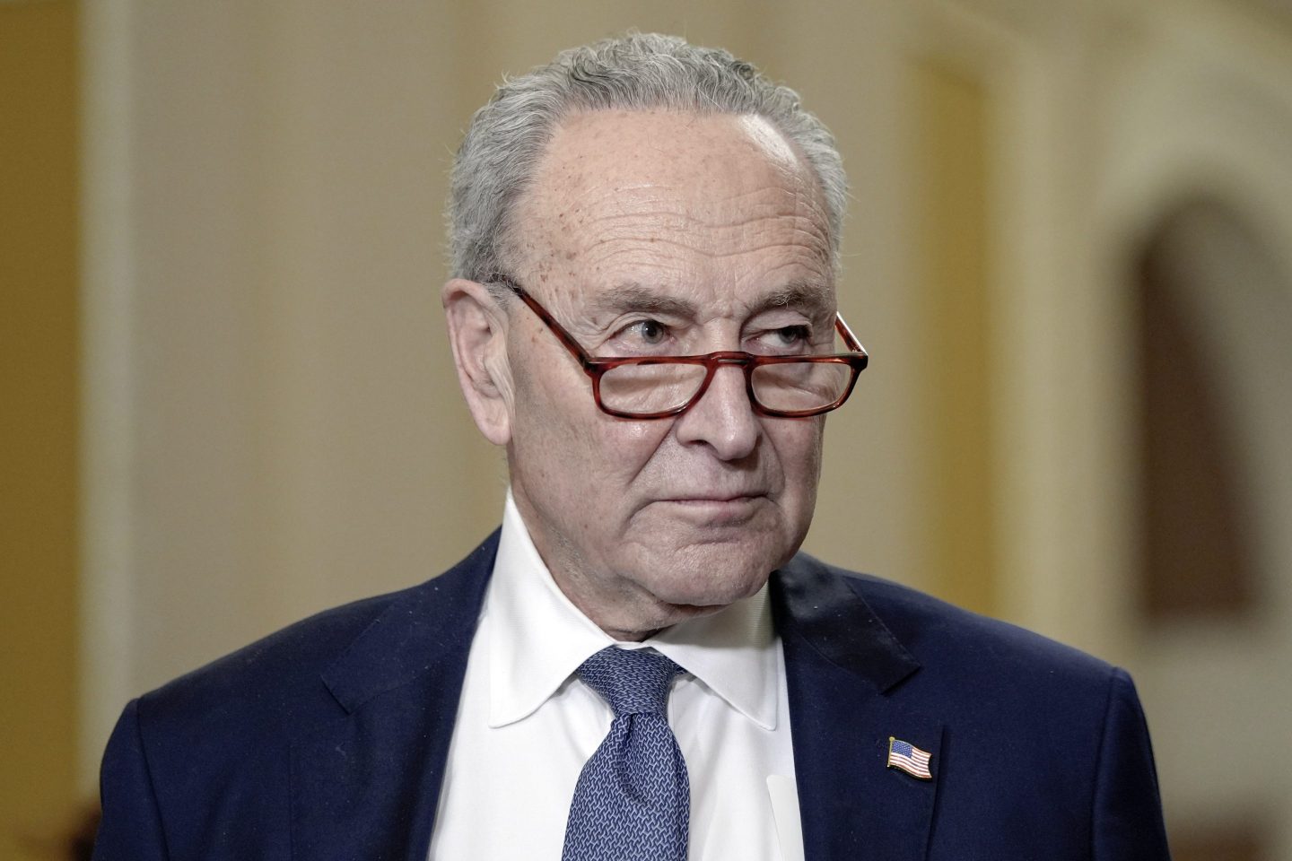 Sen. Majority Leader Chuck Schumer, D-N.Y., listens during a news conference after a policy luncheon on Capitol Hill Tuesday, Dec. 3, 2024, in Washington.