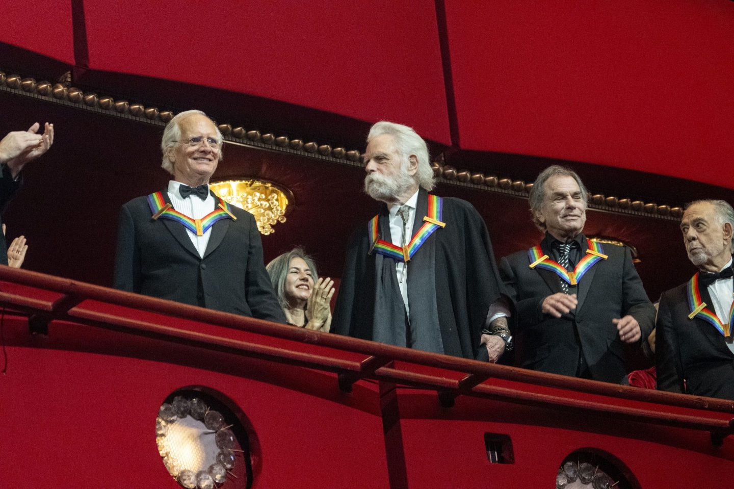2024 Kennedy Center Honorees from the band the Grateful Dead, from left, Billy Kreutzmann, Bobby Weir, and Mickey Hart are announced at the start of the Kennedy Center Honors Gala, Sunday, Dec. 8, 2024, in Washington. At right is fellow Honoree Francis Ford Coppola.