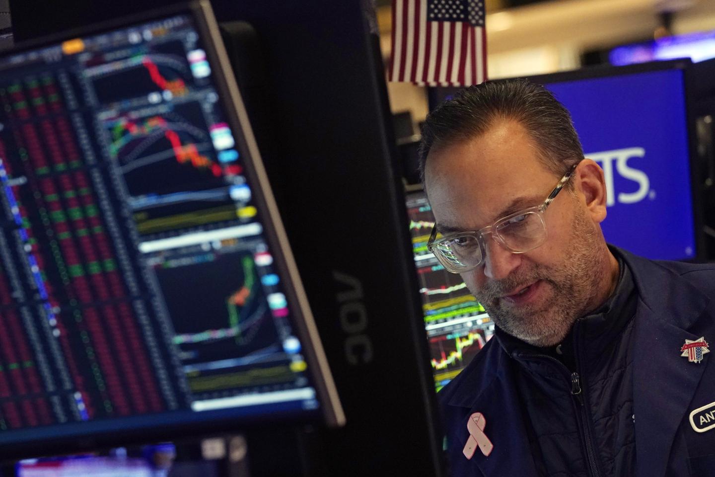 A trader works on the floor of the New York Stock Exchange