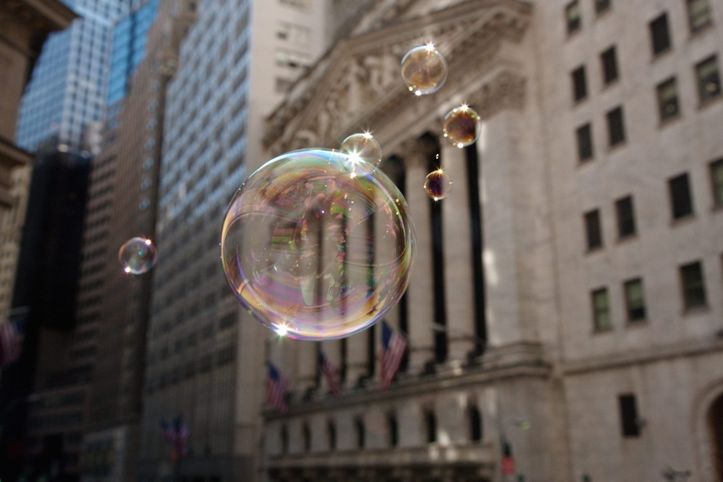 Soap bubbles in front of the New York Stock Exchange