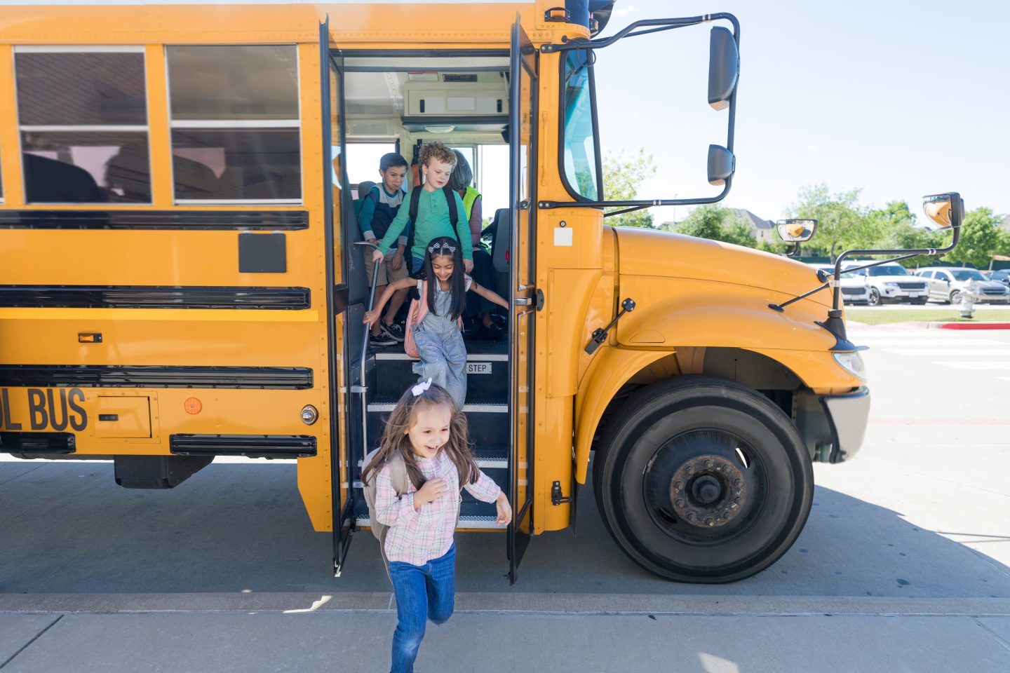 School children exit school bus
