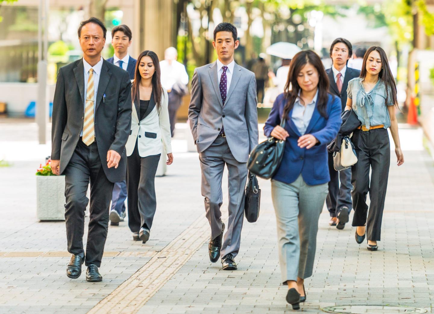Workers on their daily commute in Tokyo.