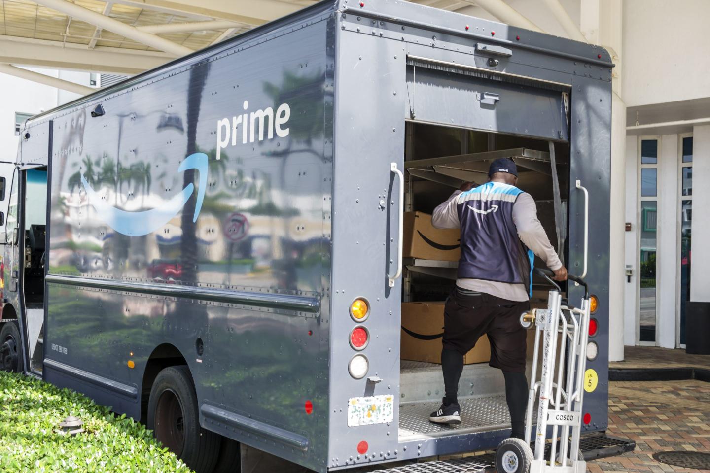Amazon driver unloading packages