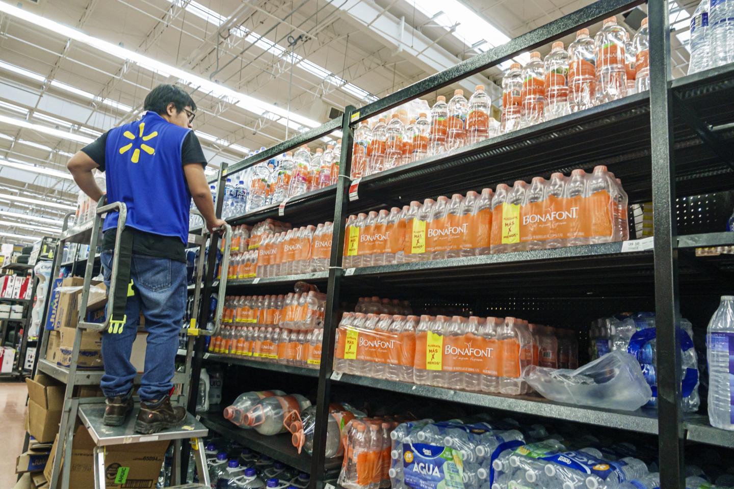 Walmart discount department store, employee restocking