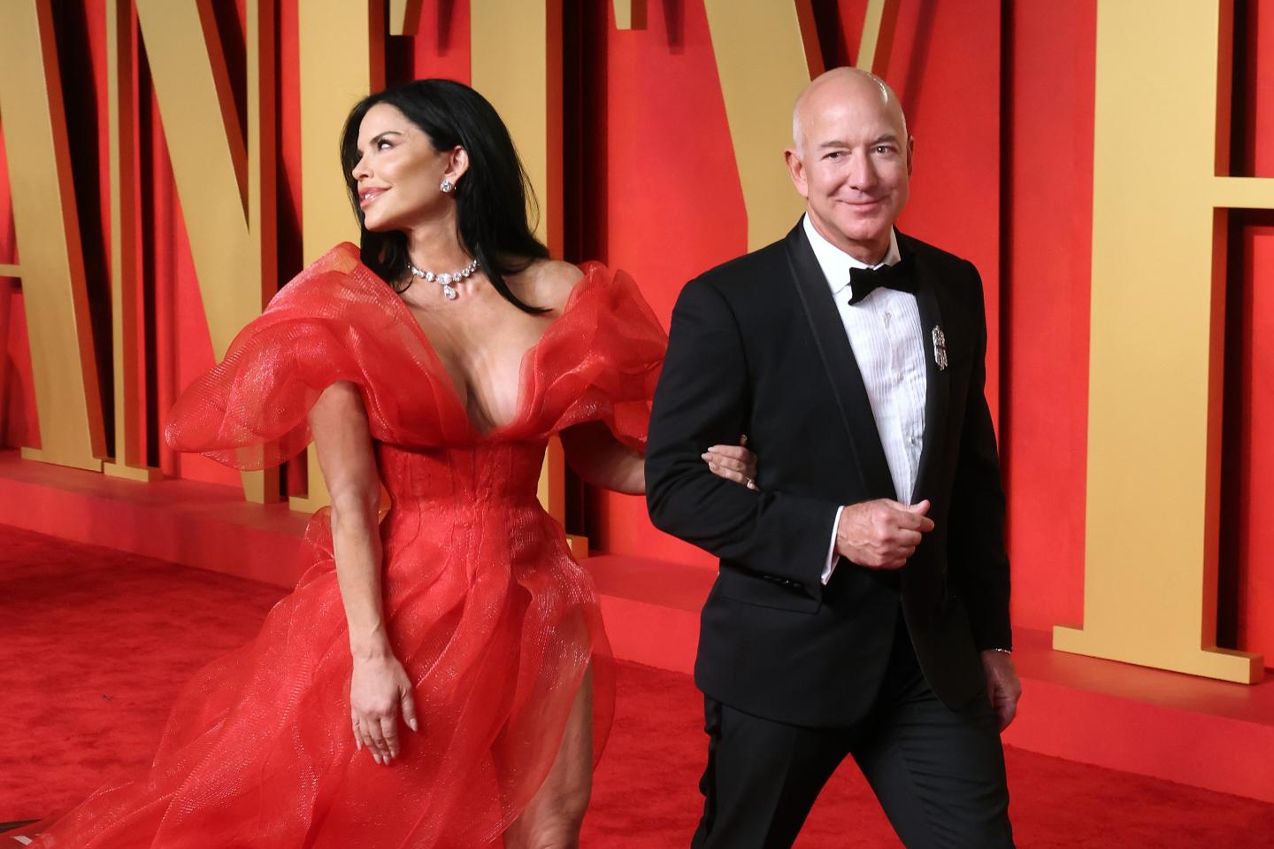 Lauren Sanchez and Jeff Bezos attend the 2024 Vanity Fair Oscar Party. 