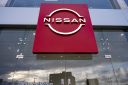 A Nissan logo is seen displayed outside a Nissan Showroom in