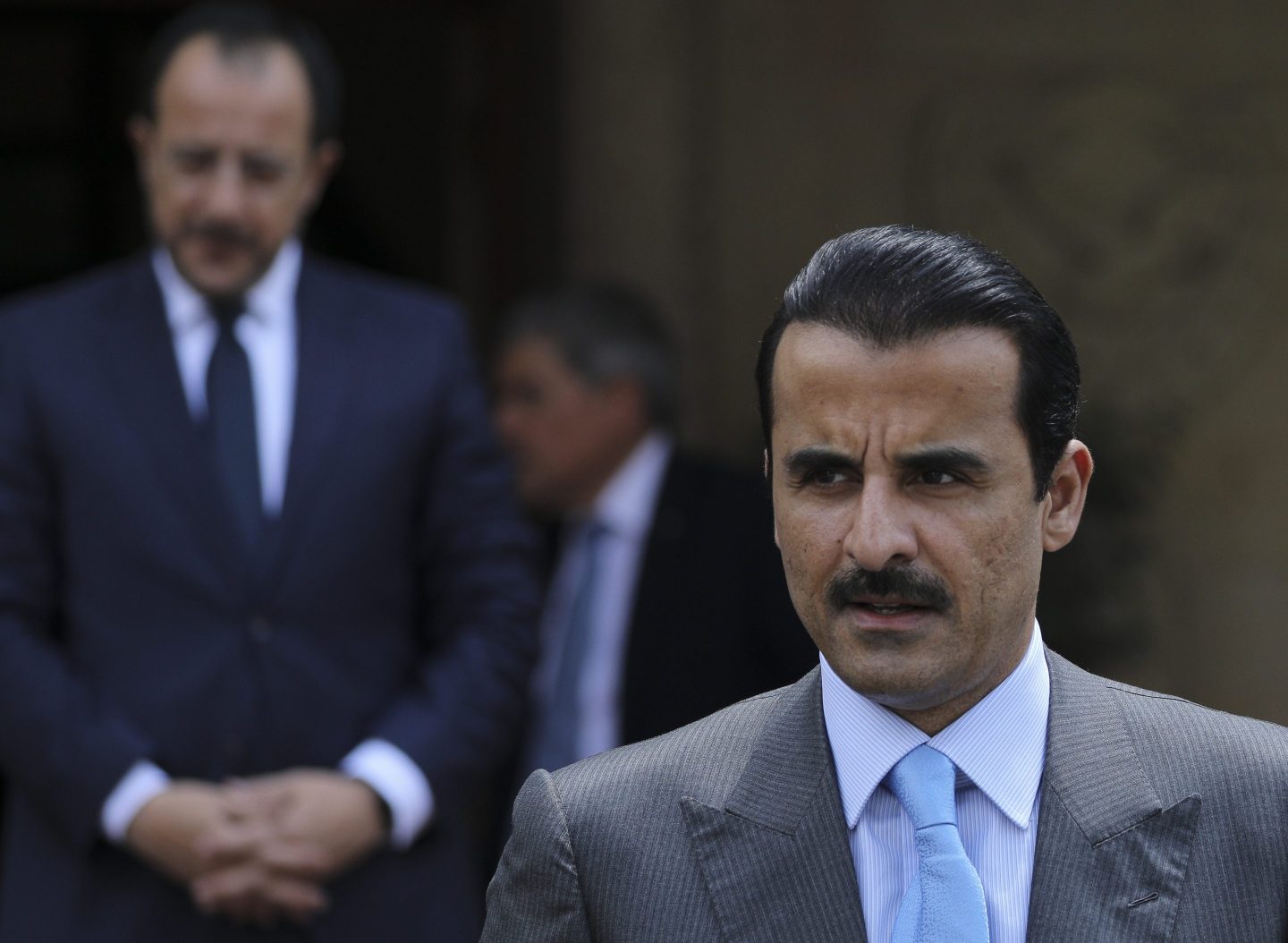 Qatar's emir was welcomed Tuesday by King Charles III at the start of a state visit where he will also hold talks with Prime Minister Keir Starmer, who wants to negotiate trade deals with Gulf monarchies.