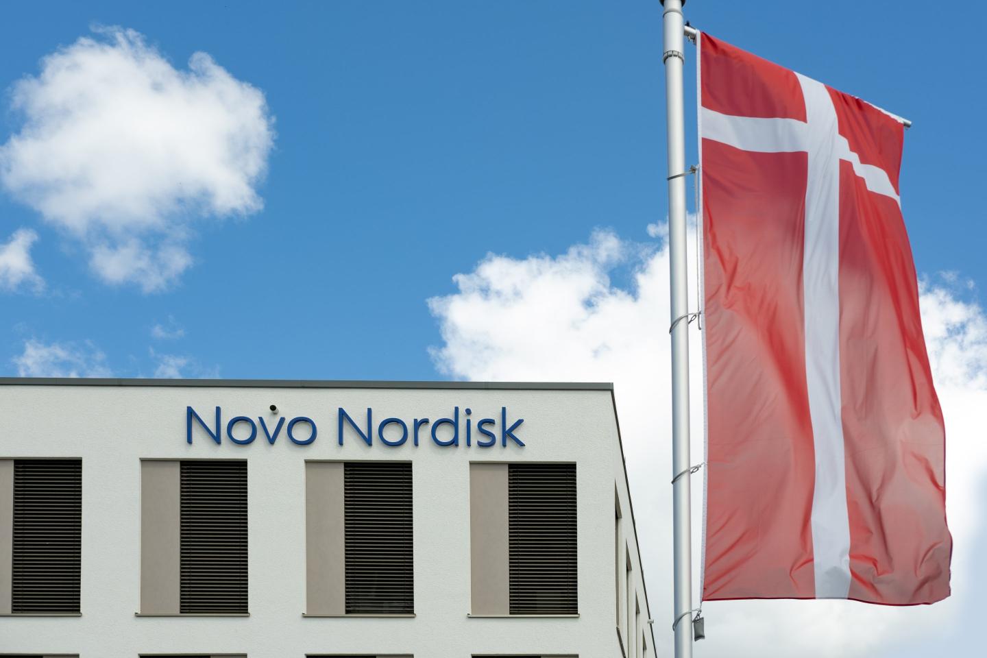 Novo Nordisk advertising flags and logo on facade, Danish pharmaceutical healthcare giant Novo Nordisk AS, production innovative drugs, obesity treatment Ozempic, Mainz, Germany June 15, 2024