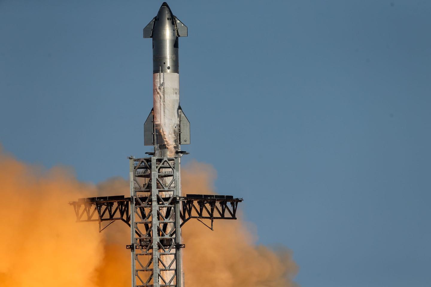SpaceX's Starship spacecraft and Super Heavy booster rocket lift off during a test flight on Nov. 19 in Boca Chica, Texas.