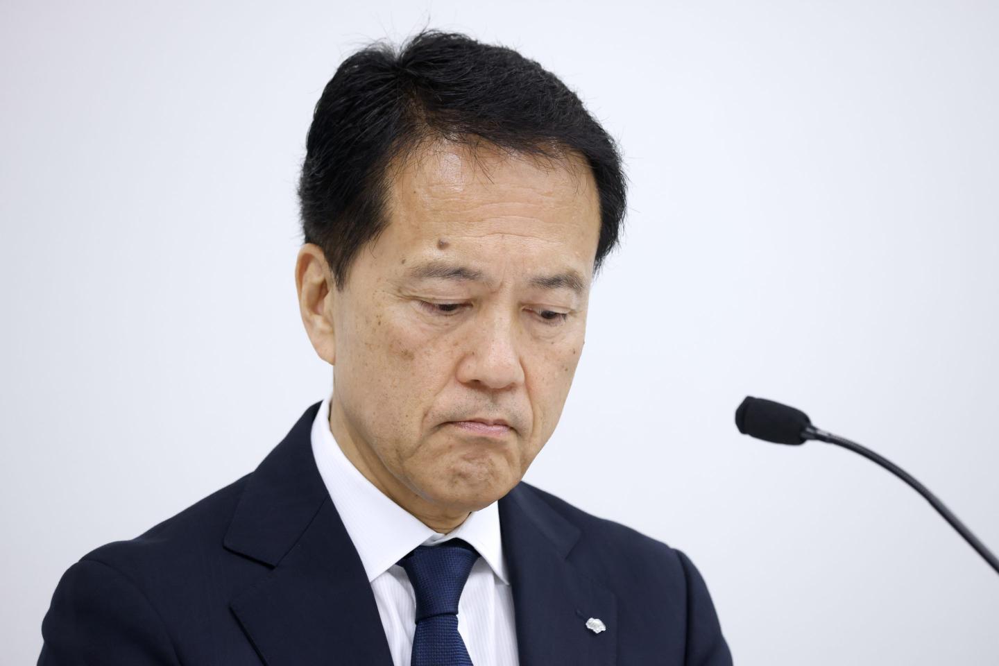 Nomura cuts CEO pay after ex-worker charged with robbery