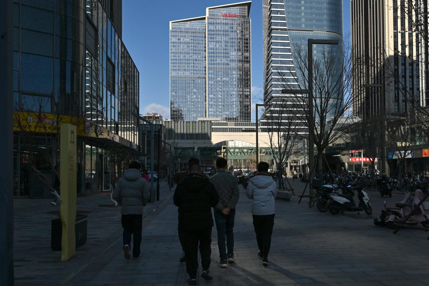 China’s finance, property firm workforces shrink for first time