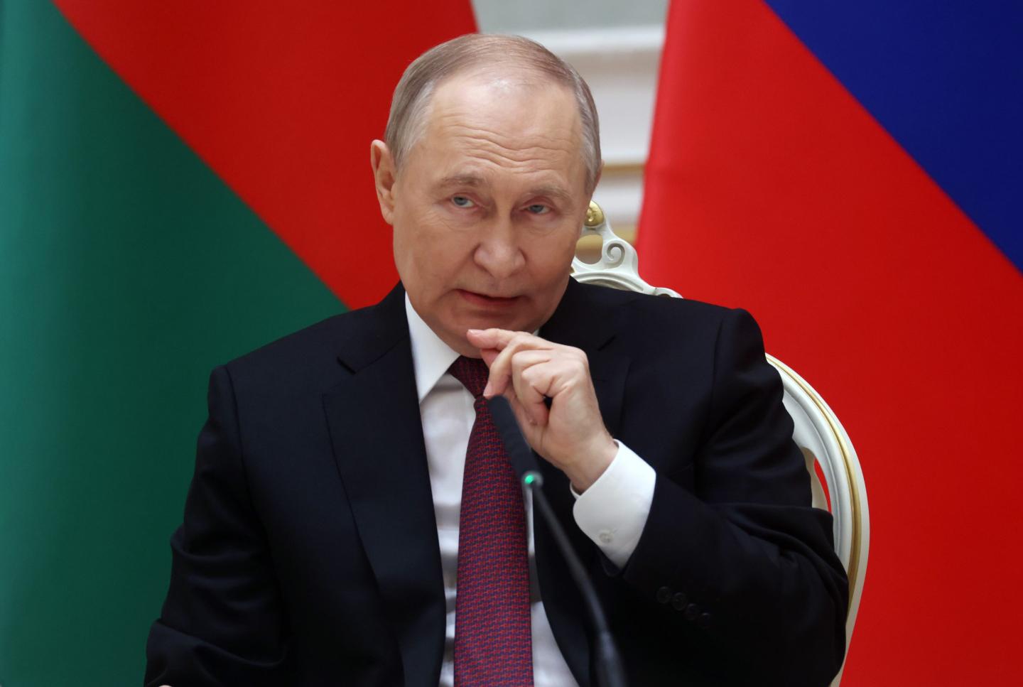 Russian President Vladimir Putin reacts during a signing ceremony at the Supreme Council of Russia and Belarus, December 6, 2024, in Minsk, Belarus.