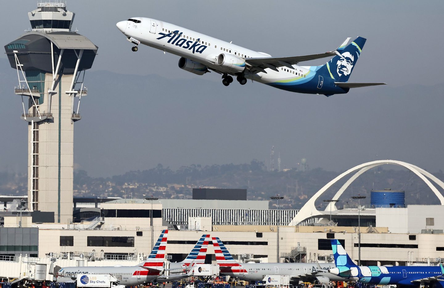 An Alaska Airlines plane takes off at Los Angeles International Airport (LAX) following the Thanksgiving holiday on Dec. 2, 2024. 