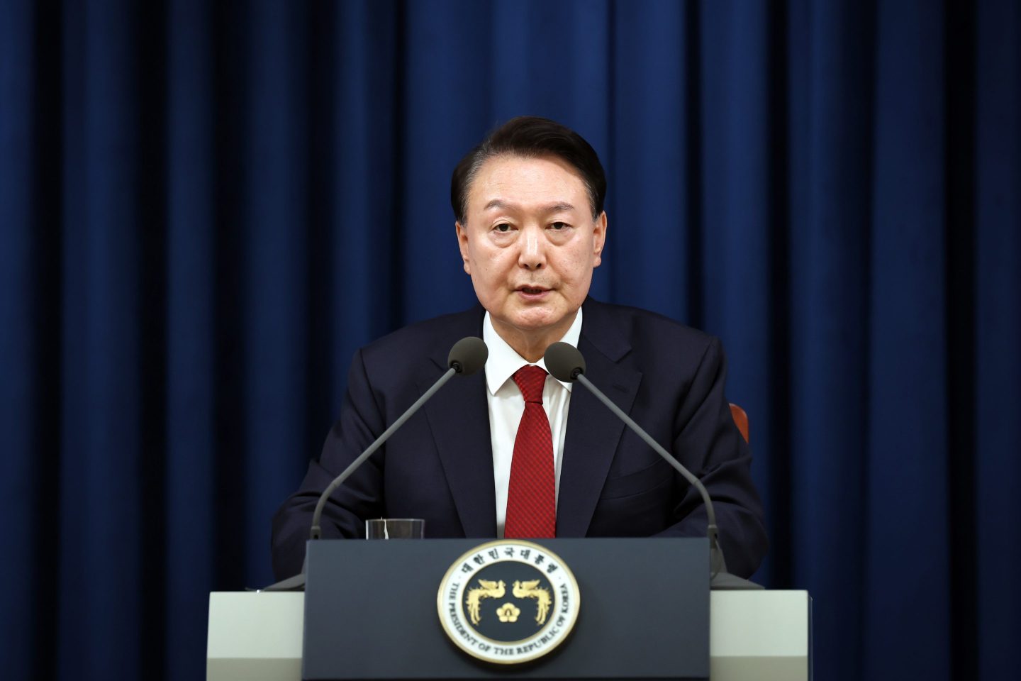 South Korean President Yoon Suk-Yeol speaks during the declaration of emergency martial law at the Presidential Office on Dec. 3, 2024 in Seoul.