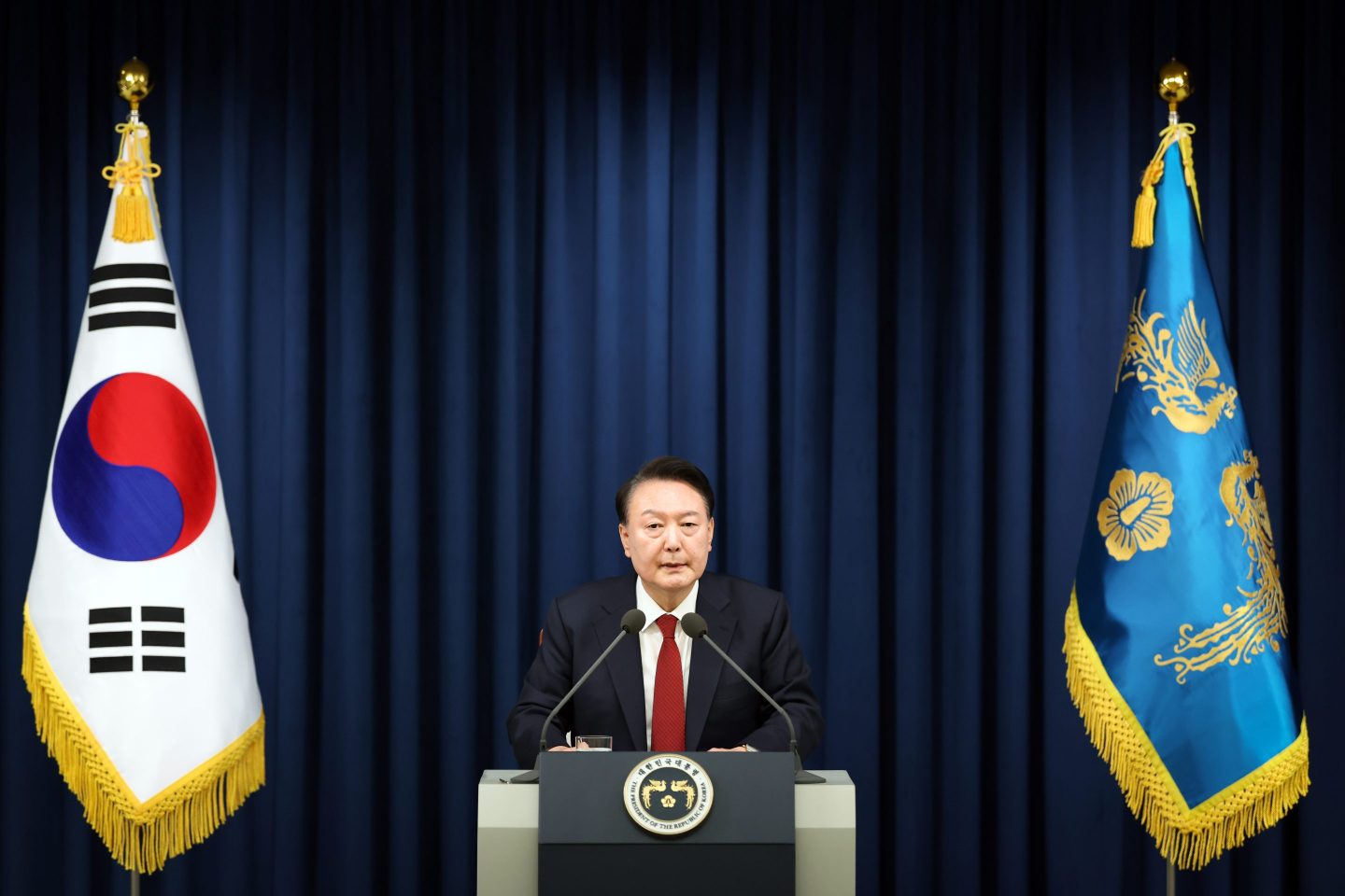 South Korean President Yoon Suk-Yeol speaks during the declaration of emergency martial law on Dec. 03.