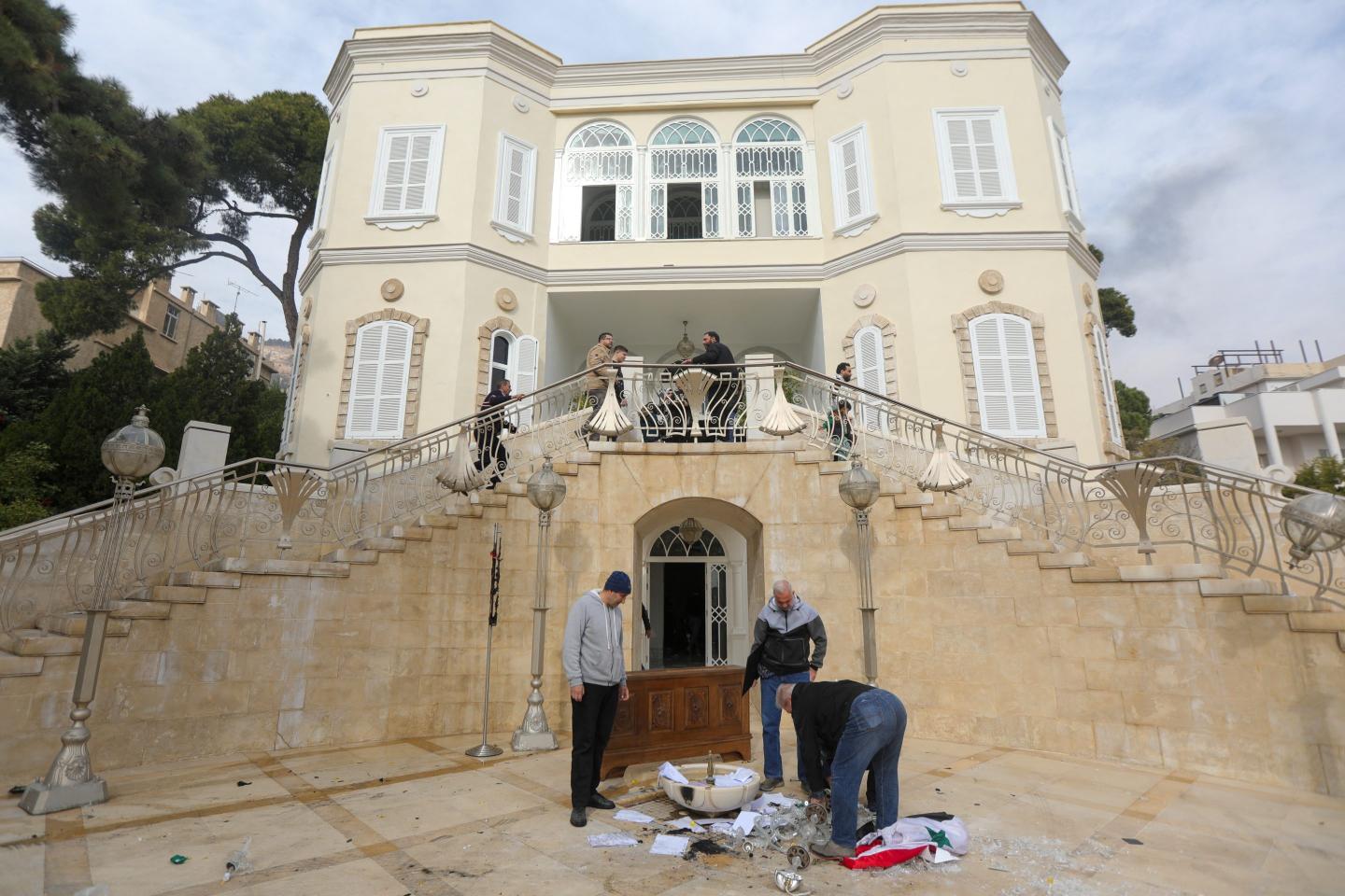 This was Bashar al-Assad’s mansion. Syrians are now helping themselves to its opulence after the ousted dictator fled to Russia