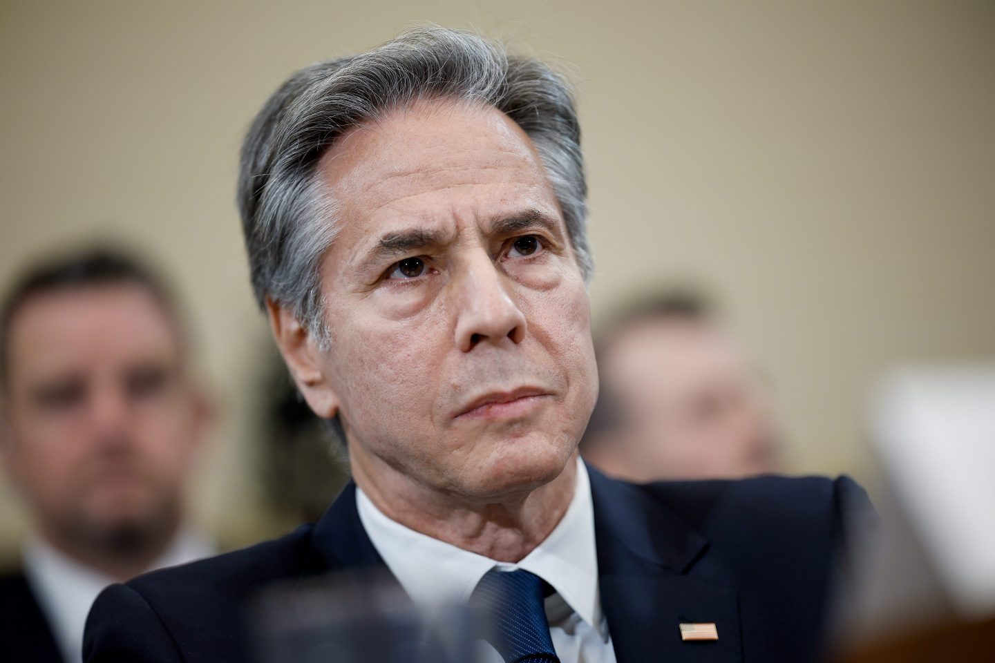 Secretary of State Antony Blinken sits in a hearing