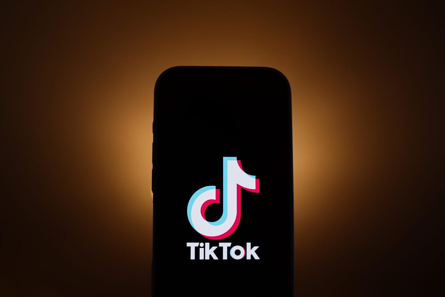 TikTok logo displayed on a phone screen