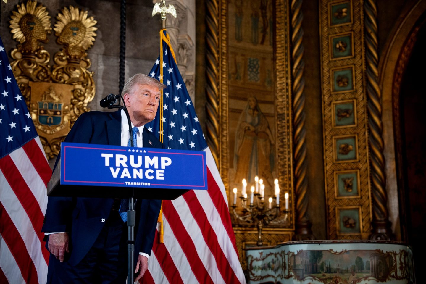 Trump stands in front of a podium inside Mar-a-Lago
