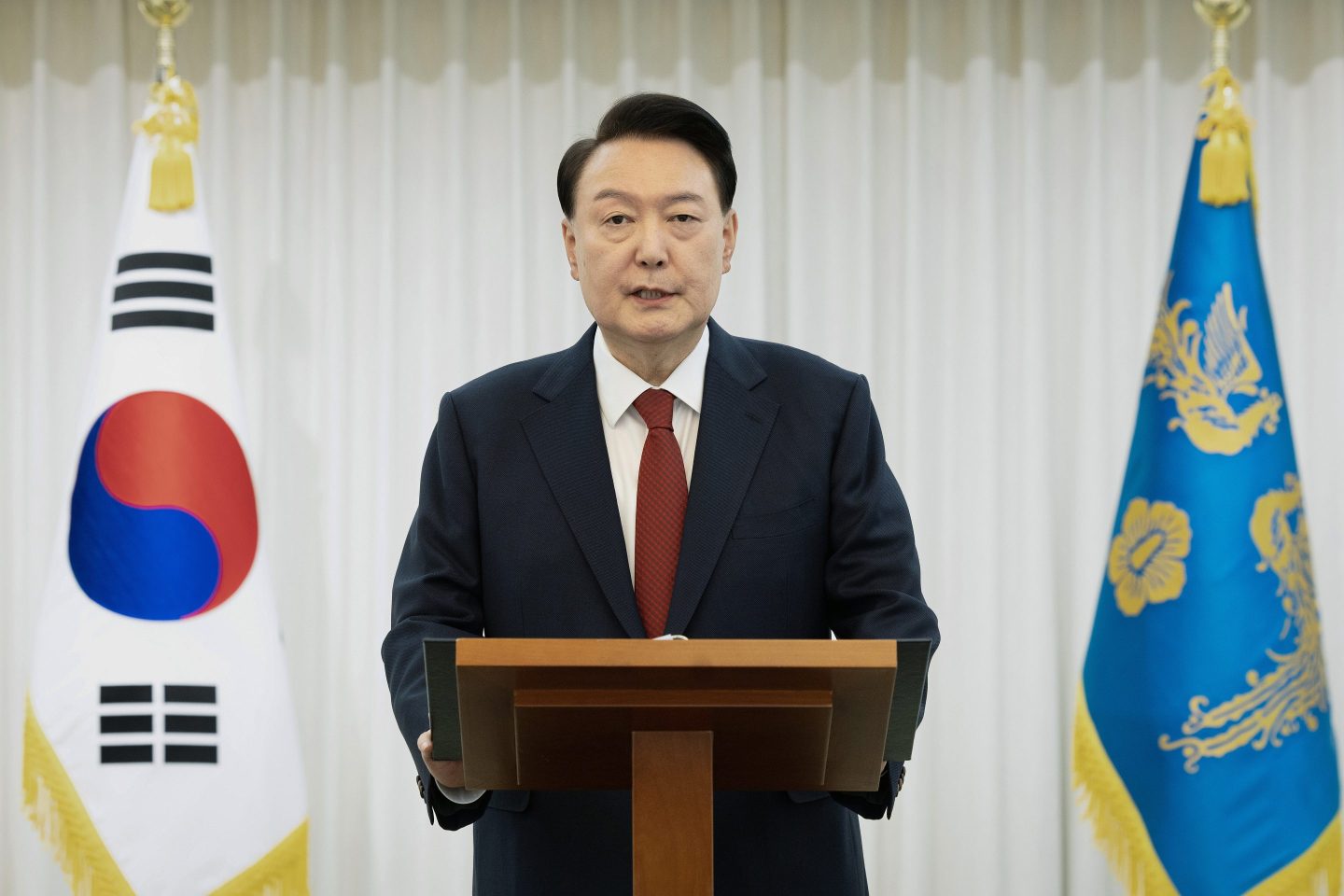South Korean President Yoon Suk-Yeol speak to the nation at the Presidential Office on Dec. 14, 2024 in Seoul. The National Assembly voted Dec. 14, 2024 to impeach President Yook over his botched imposition of martial law.