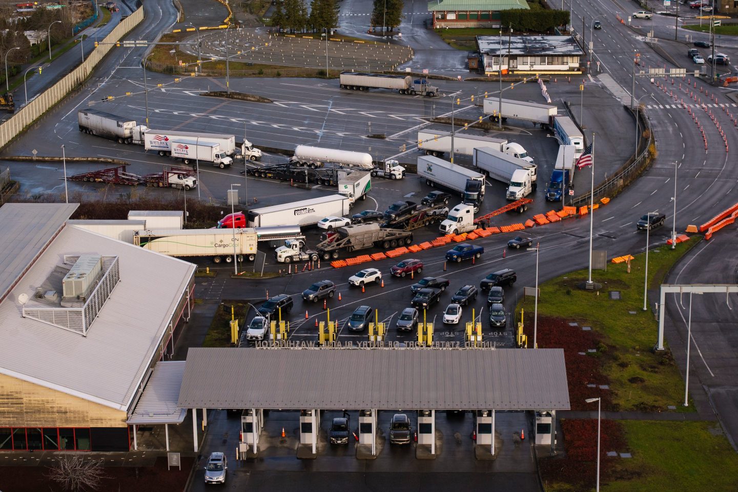Tractor trailers and private vehicles entering the United States from Canada at the Pacific Highway Border Crossing