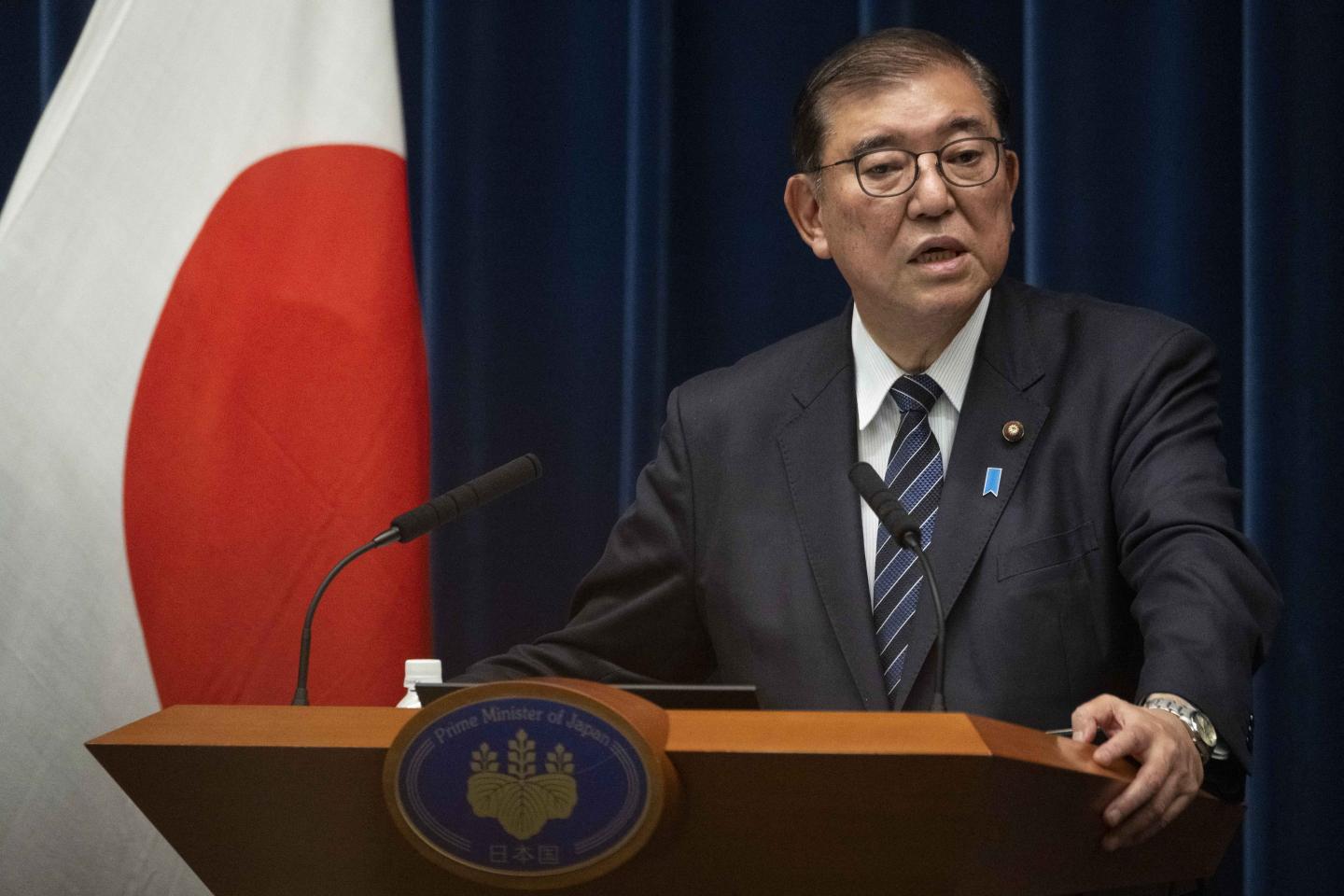 Japan approves its largest budget ever, boosts social welfare and defense spending