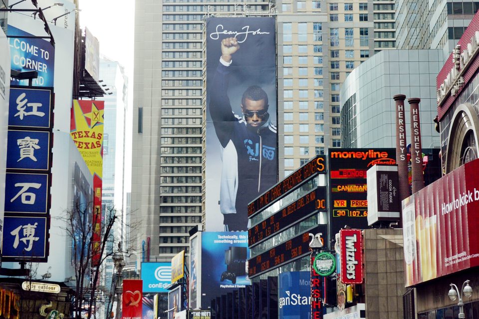 A billboard for Sean John clothing featuring Sean Combs in Times Square in 2004.