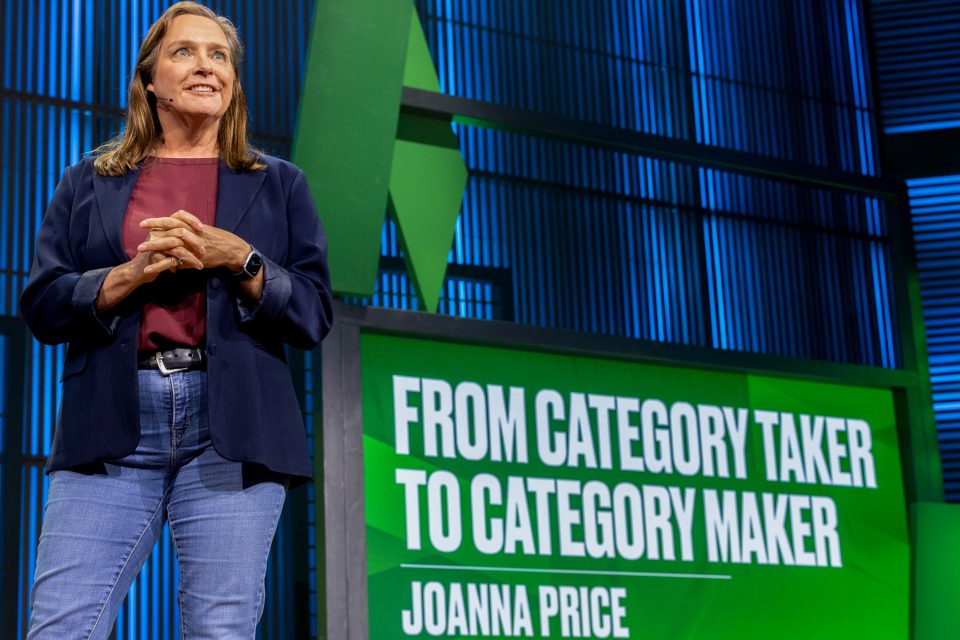 Joanna Price speaking on stage