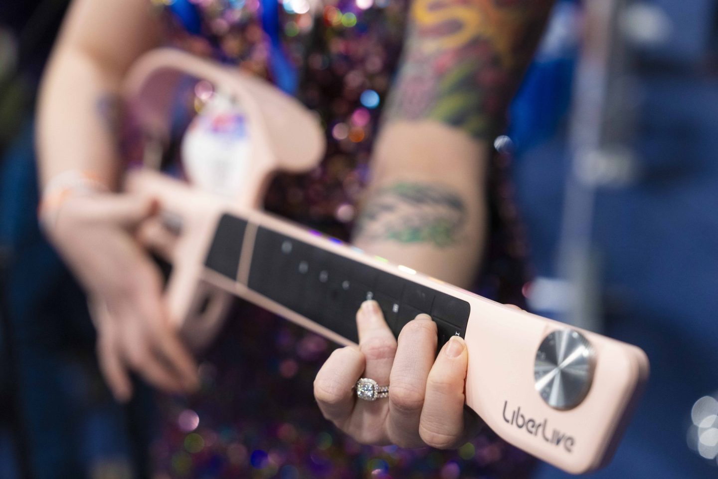LiberLive showcases their stringless guitar