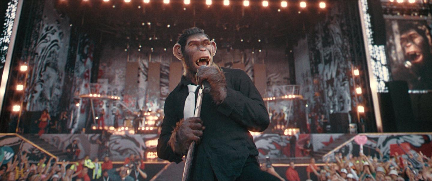This image released by Paramount Pictures shows Jonno Davies in a scene from "Better Man." The British popstar is portrayed by a CGI chimpanzee in Michael Gracey’s film.
