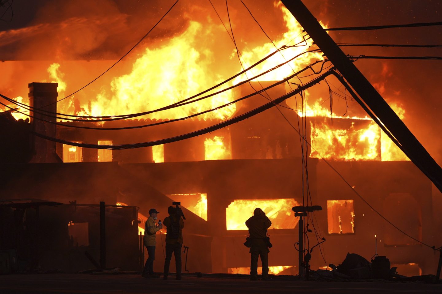 Beach front homes are destroyed by the Palisades Fire on Jan. 8, 2025 in Malibu, Calif.