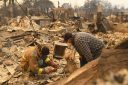 Los Angeles wildfire destruction tops 10 dead and 10,000 structures burned as new blaze ignites and Pacific Palisades remains uncontained