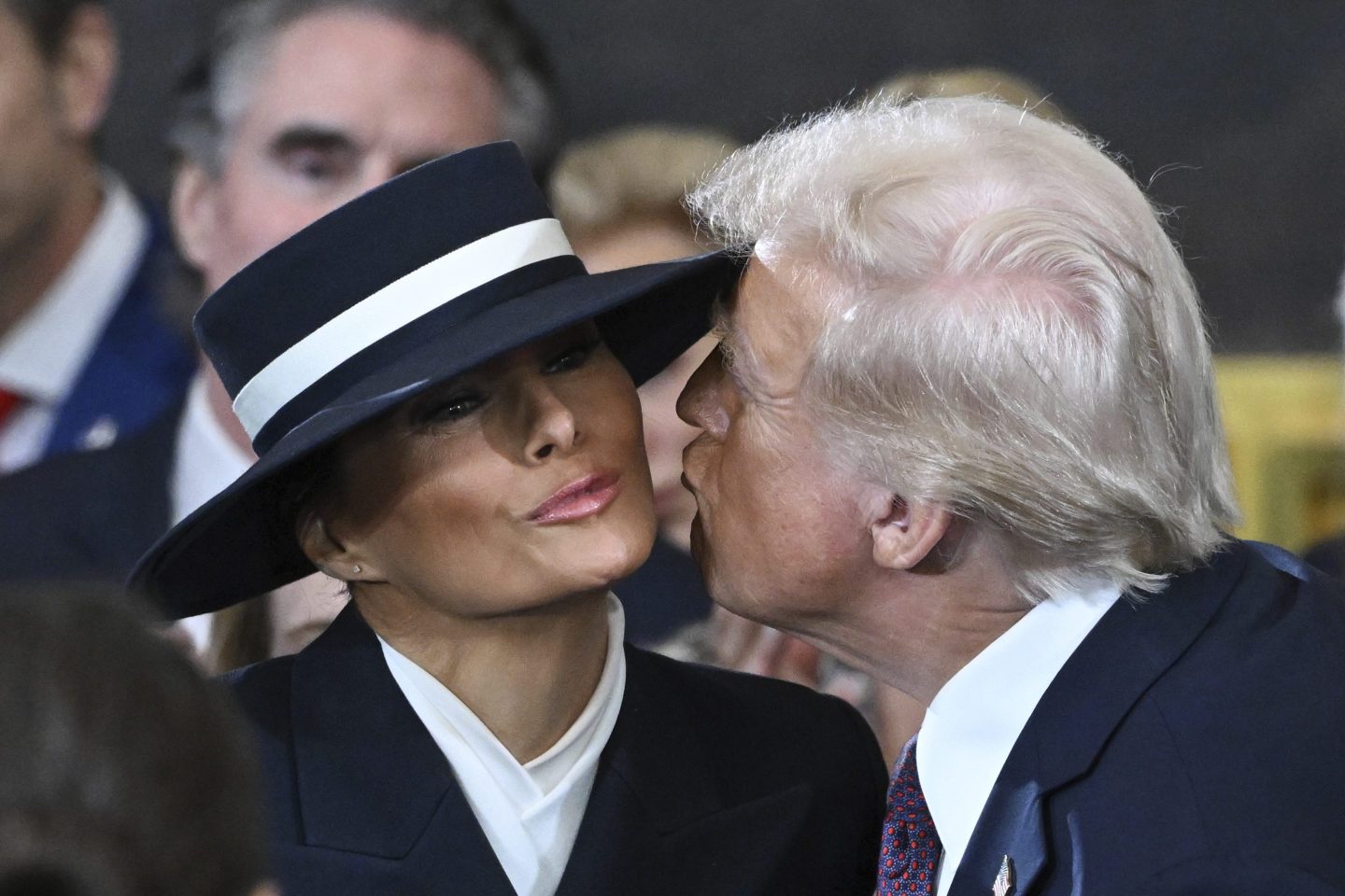Trump leans in to give Melania a kiss on his Inauguration Day