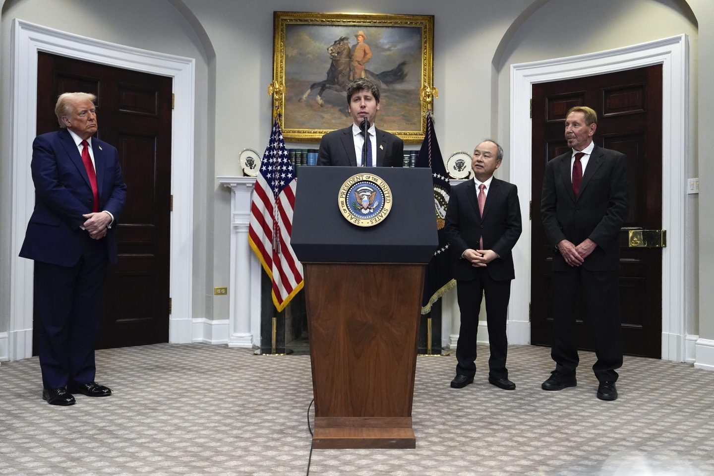 Sam Altman, OpenAI CEO, speaks as President Donald Trump, left, Masayoshi Son, SoftBank Group CEO, third from left, and, Larry Ellison, chairman of Oracle Corporation and chief technology officer, right, listen, in the Roosevelt Room at the White House, on Jan. 21, 2025, in Washington.