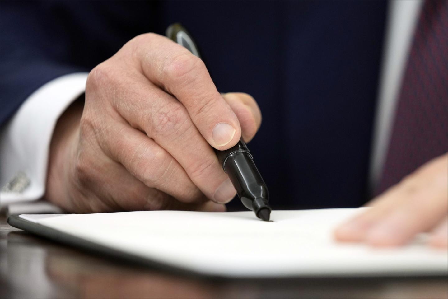 Trump signs executive order to cull Biden AI policies and develop a version ‘free from ideological bias’